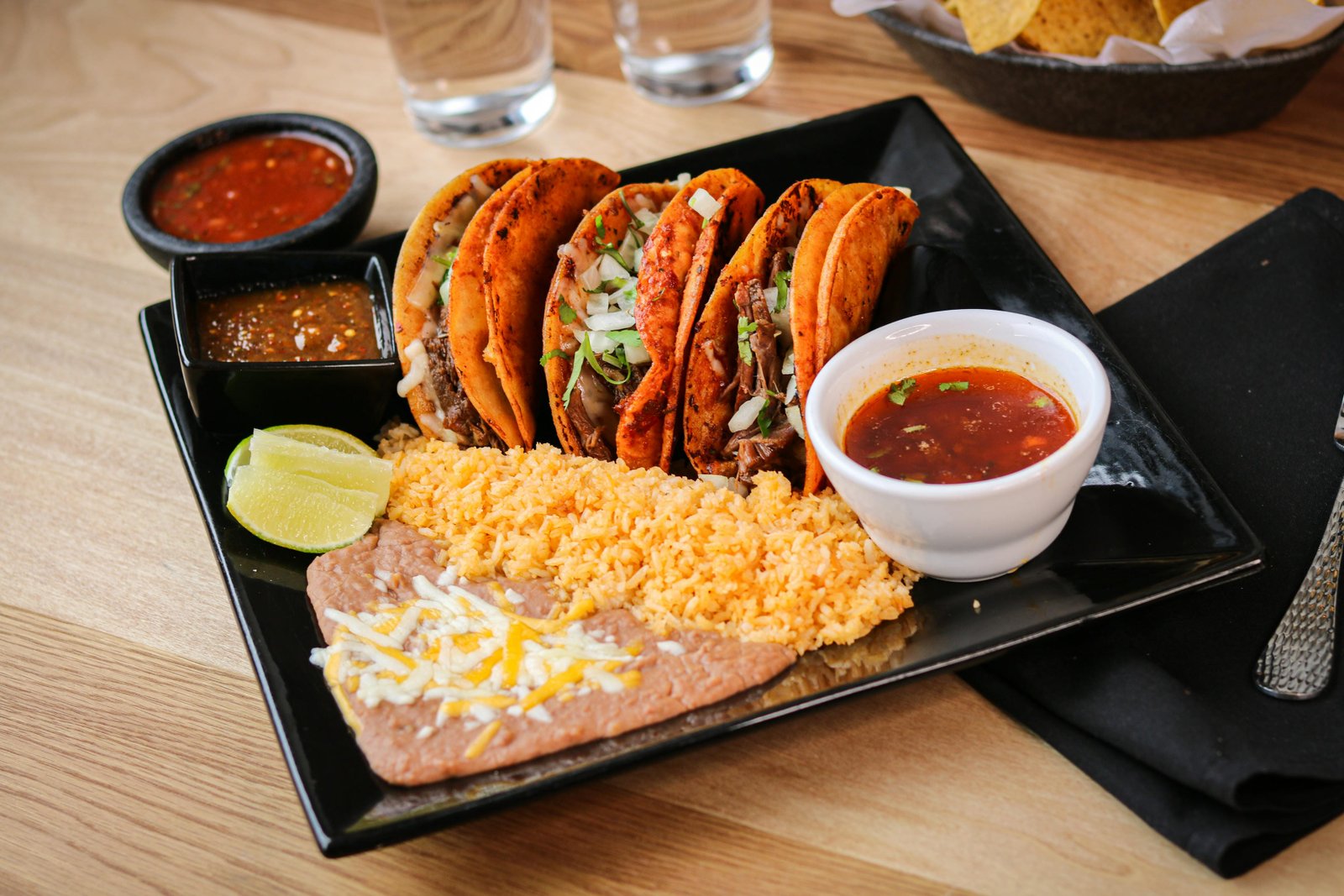 Quesabirria tacos with consommé at Tequila Fuego Longview Washington